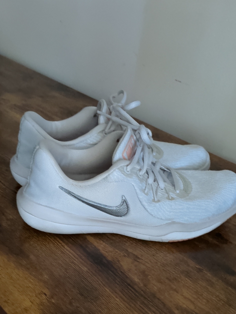 Nike Women's White Running Sneakers with Silver Swoosh